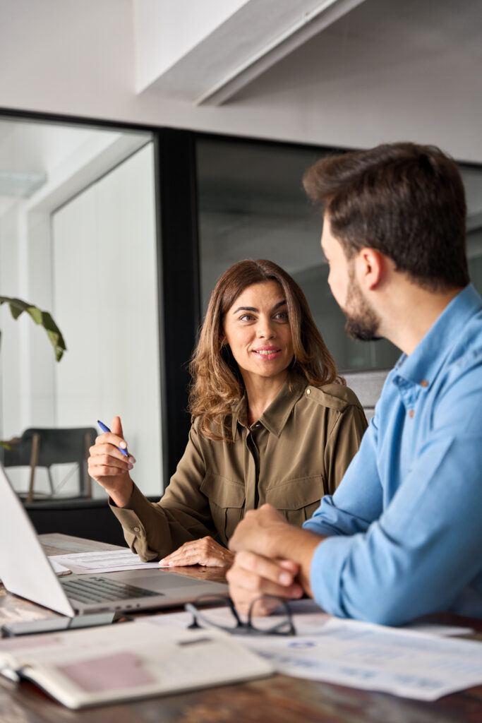 man and woman talking image