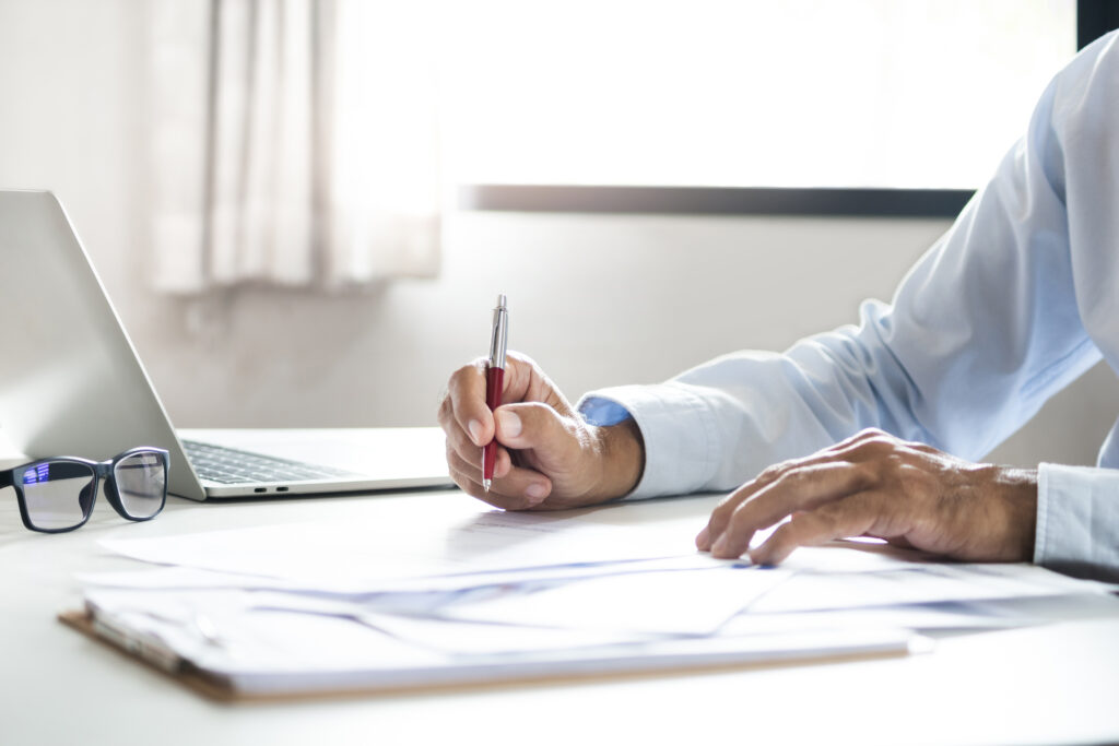 Person working on reports image